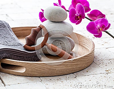 Ayurveda and mindfulness for calming body massage over balancing stones Stock Photo