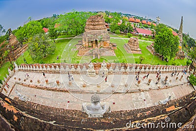 AYUTTHAYA, THAILAND, FEBRUARY, 08, 2018: Beautiful landscape with unidentified people walking at Wat Chaiwatthanaram Editorial Stock Photo