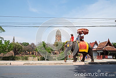 Ayutthaya,Thailand - May 09 2015 : Elephant take visitors tour the temple Editorial Stock Photo