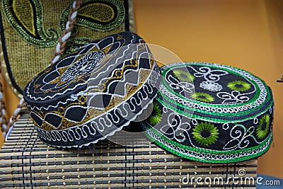 Azerbaijan's national hat is embroidered . traditional muslim hats sold on a local market in Icheri Sheher Old Town in the Center Stock Photo