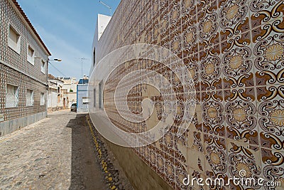 Azulejos Portuguese exterior wall tiles in Tavira, Portugal Stock Photo