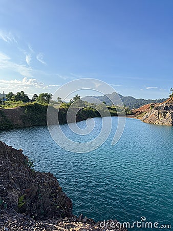 Azure Oasis: The Enchanting Blue Lake Stock Photo