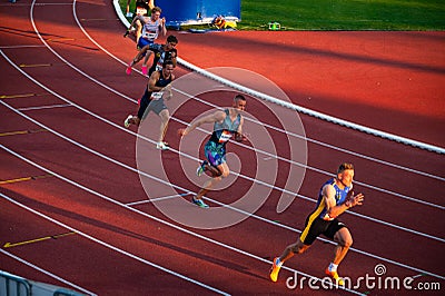 B. BYSTRICA, SLOVAKIA, JULY 20, 2023: Men Participating in the 200m Sprint Race at Track and Field Championship for Worlds in Editorial Stock Photo