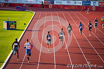 Men's 400m Race Takes Center Stage in the Enthralling Evening Glow at Track and Field Editorial Stock Photo