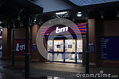 B and M main entrance, Syston, Leicester, UK, taken at night time with lights on in store, empty store Editorial Stock Photo