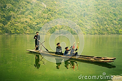 Ba Be lake, Bac Kan province, Vietnam - April 4, 2017 : tourists on the boat are going to enjoy and explore Ba Be lake. Editorial Stock Photo