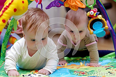 Babies crawling Stock Photo