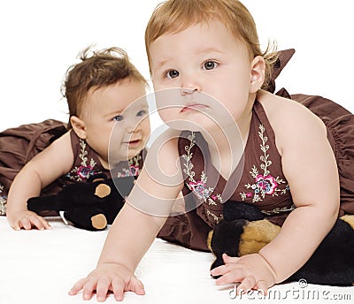 Babies exploring and playing Stock Photo