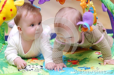 Babies playing Stock Photo