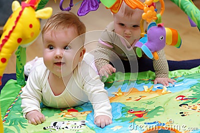 Babies playing Stock Photo