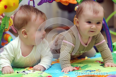 Babies playing Stock Photo