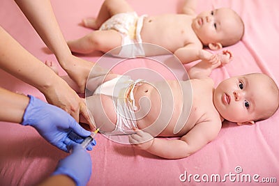 Babies receiving vaccine. Stock Photo