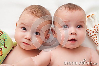 Babies with toys Stock Photo