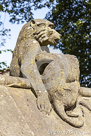 Baboon monkey sculpture from the Animal Wall of Cardiff Castle in Wales Stock Photo