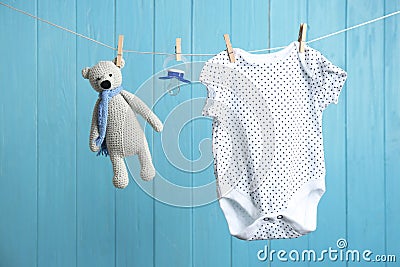 Baby accessories on laundry line Stock Photo