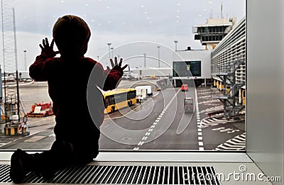 Baby in the airport Stock Photo