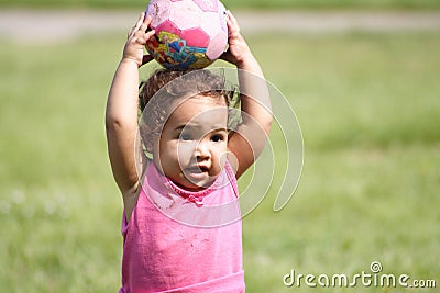 Baby and a ball Stock Photo