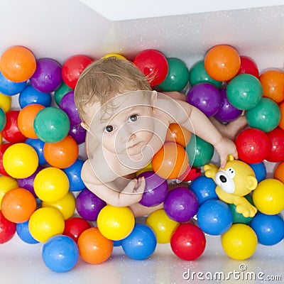 Baby in balls Stock Photo