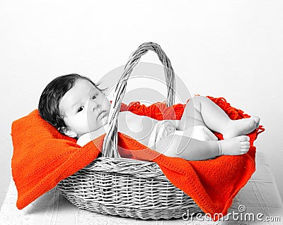 Baby in basket Stock Photo