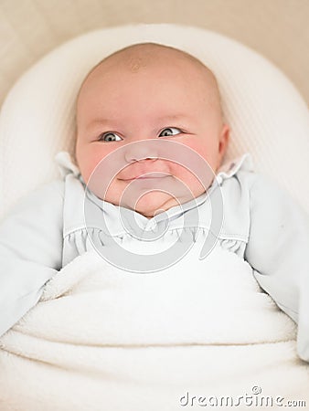 Baby in Bassinet Stock Photo