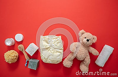 Baby bathing and diaper changing products background, top view Stock Photo