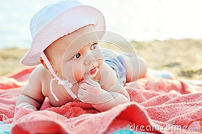 Baby on the beach Stock Photo