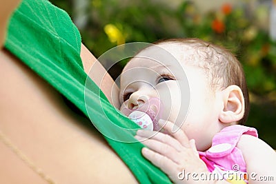 Baby Being Held By Mother Stock Photo