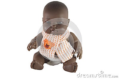 Baby black doll with scarf Stock Photo