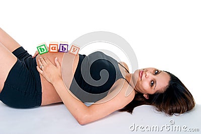 Baby Blocks On Stomach Stock Photo