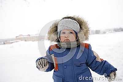 Baby blond boy winter outdoors Stock Photo