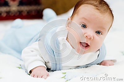 Baby in blue toddlers Stock Photo