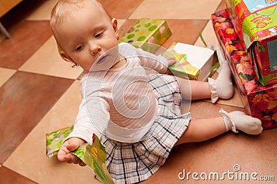 Baby on box presents Stock Photo