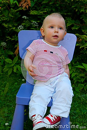 Baby on box presents Stock Photo