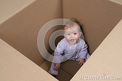 Baby in Box ready to be shipped Stock Photo