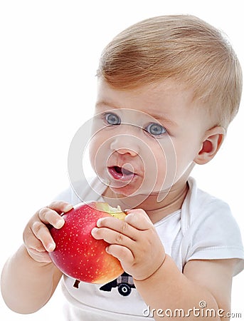 Baby boy with apple Stock Photo