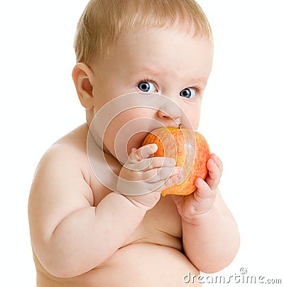 Baby boy eating healthy food isolated Stock Photo