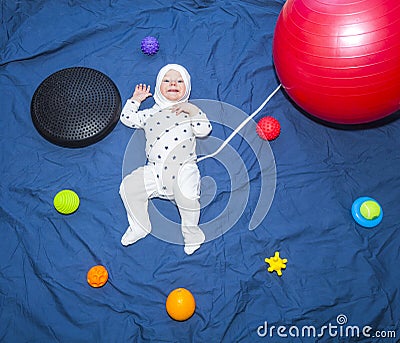 Baby boy Astronaut in outer space Stock Photo