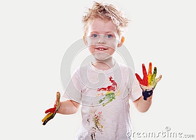 The baby boy with gouache soiled hands and shirt isolated Stock Photo