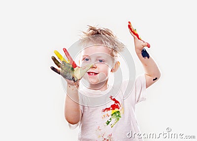 The baby boy with gouache soiled hands and shirt isolated Stock Photo