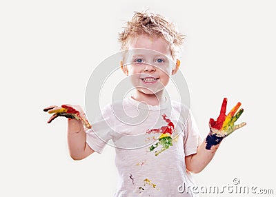 The baby boy with gouache soiled hands and shirt isolated Stock Photo