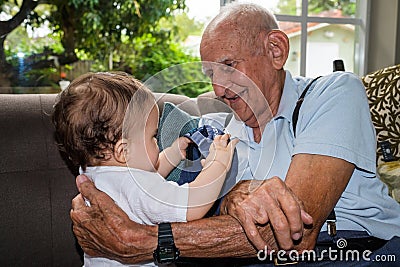 Baby boy with great grandfather Stock Photo