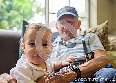 Baby boy with great grandfather Stock Photo