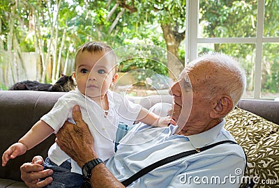 Baby boy with great grandfather Stock Photo