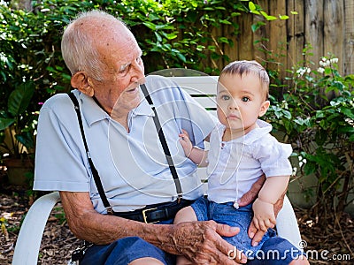 Baby boy with great grandfather Stock Photo