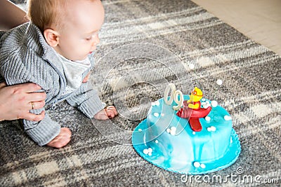 Baby boy having his nine month birthday Stock Photo