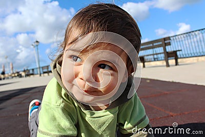 Baby boy olaying on playground Stock Photo