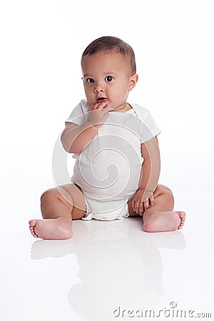 Baby Boy with a Quizzical, Contemplative Expression Stock Photo