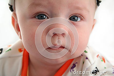 Baby Boy with Serious Face Stock Photo