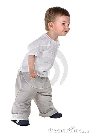 Baby boy stands Stock Photo