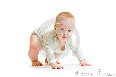 Baby boy toddler isolated trying to stand up Stock Photo